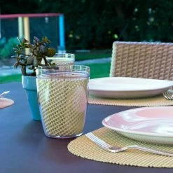 Fishnet 17 in. x 12 in. Ivory PVC Covered Jute Oval Placemat (Set of 6) by Kraftware -Kraftware Sales Store beige cream kraftware placemats 11346 31 1000