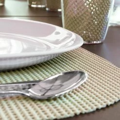 Fishnet 17 in. x 12 in. Ivory PVC Covered Jute Oval Placemat (Set of 6) by Kraftware -Kraftware Sales Store beige cream kraftware placemats 11346 4f 1000