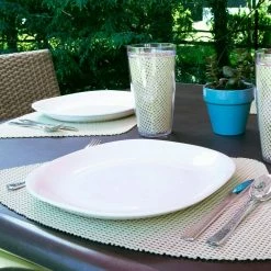 Fishnet 19 in. x 13 in. Ivory PVC Covered Jute Wedge Placemat (Set of 6) by Kraftware -Kraftware Sales Store beige cream kraftware placemats 11349 31 1000