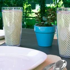 Fishnet 19 in. x 13 in. Ivory PVC Covered Jute Wedge Placemat (Set of 6) by Kraftware -Kraftware Sales Store beige cream kraftware placemats 11349 4f 1000