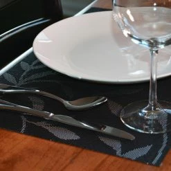 EveryTable 18 in. x 12 in. Leaves on Black Jacquard PVC Placemat (Set of 6) by Kraftware -Kraftware Sales Store blacks kraftware placemats 44747 4f 1000