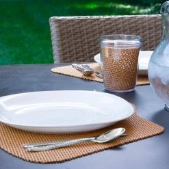 Fishnet 19 in. x 13 in. Toffee PVC Covered Jute Wedge Placemat (Set of 6) by Kraftware -Kraftware Sales Store browns tans kraftware placemats 38749 31 1000