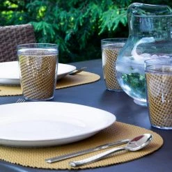 Fishnet 17 in. x 12 in. Bronze Mist PVC Covered Jute Oval Placemat (Set of 6) by Kraftware -Kraftware Sales Store browns tans kraftware placemats 39846 31 1000