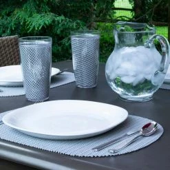 Fishnet 17 in. x 12 in. Ultimate Gray PVC Covered Jute Oval Placemat (Set of 6) by Kraftware -Kraftware Sales Store grays kraftware placemats 39946 31 1000