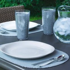 Fishnet 17 in. x 12 in. Ultimate Gray PVC Covered Jute Oval Placemat (Set of 6) by Kraftware -Kraftware Sales Store grays kraftware placemats 39946 4f 1000