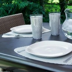 Fishnet 19 in. x 13 in. Light Gray PVC Covered Jute Wedge Placemat (Set of 6) by Kraftware -Kraftware Sales Store grays kraftware placemats 40249 31 1000