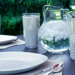 Fishnet 19 in. x 13 in. Light Gray PVC Covered Jute Wedge Placemat (Set of 6) by Kraftware -Kraftware Sales Store grays kraftware placemats 40249 4f 1000