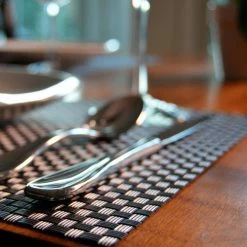EveryTable 18 in. x 12 in. Gun Metal Gray Metallic Woven PVC Placemat (Set of 6) by Kraftware -Kraftware Sales Store grays kraftware placemats 45747 4f 1000