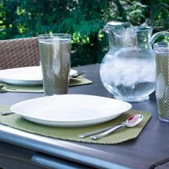 Fishnet 19 in. x 13 in. Moss PVC Covered Jute Wedge Placemat (Set of 6) by Kraftware -Kraftware Sales Store greens kraftware placemats 38349 31 1000