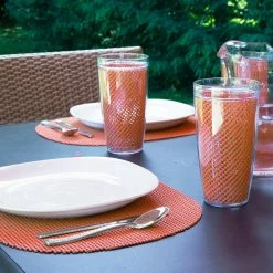 Fishnet 17 in. x 12 in. Spice Orange PVC Covered Jute Oval Placemat (Set of 6) by Kraftware -Kraftware Sales Store oranges peaches kraftware placemats 14846 4f 1000