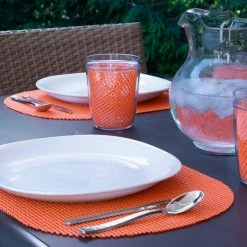 Fishnet 17 in. x 12 in. Peach Echo PVC Covered Jute Oval Placemat (Set of 6) by Kraftware -Kraftware Sales Store oranges peaches kraftware placemats 39146 31 1000