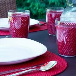 Fishnet 17 in. x 12 in. Flag Red PVC Covered Jute Oval Placemat (Set of 6) by Kraftware -Kraftware Sales Store reds pinks kraftware placemats 33046 4f 1000