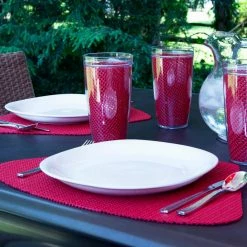 Fishnet 19 in. x 13 in. Flag Red PVC Covered Jute Wedge Placemat (Set of 6) by Kraftware -Kraftware Sales Store reds pinks kraftware placemats 33049 31 1000