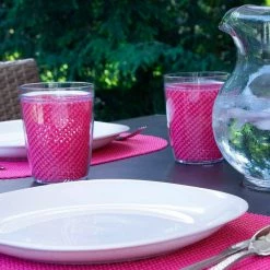 Fishnet 17 in. x 12 in. Pink Yarrow PVC Covered Jute Oval Placemat (Set of 6) by Kraftware -Kraftware Sales Store reds pinks kraftware placemats 39446 4f 1000
