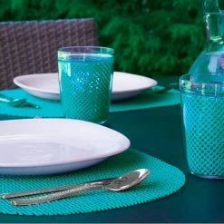 Fishnet 17 in. x 12 in. Teal PVC Covered Jute Oval Placemat (Set of 6) by Kraftware -Kraftware Sales Store turquoises aquas kraftware placemats 32046 4f 1000
