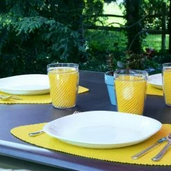 Fishnet 19 in. x 13 in. Yellow PVC Covered Jute Wedge Placemat (Set of 6) by Kraftware -Kraftware Sales Store yellows golds kraftware placemats 11649 31 1000