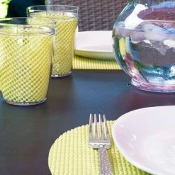 Fishnet 17 in. x 12 in. Lemon PVC Covered Jute Oval Placemat (Set of 6) by Kraftware -Kraftware Sales Store yellows golds kraftware placemats 13946 4f 1000