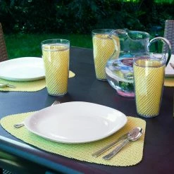 Fishnet 19 in. x 13 in. Lemon PVC Covered Jute Wedge Placemat (Set of 6) by Kraftware -Kraftware Sales Store yellows golds kraftware placemats 13949 31 1000
