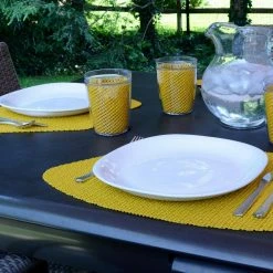 Fishnet 19 in. x 13 in. Golden PVC Covered Jute Wedge Placemat (Set of 6) by Kraftware -Kraftware Sales Store yellows golds kraftware placemats 35349 31 1000